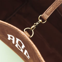 Brown suede timeless tote detail shot clasp
