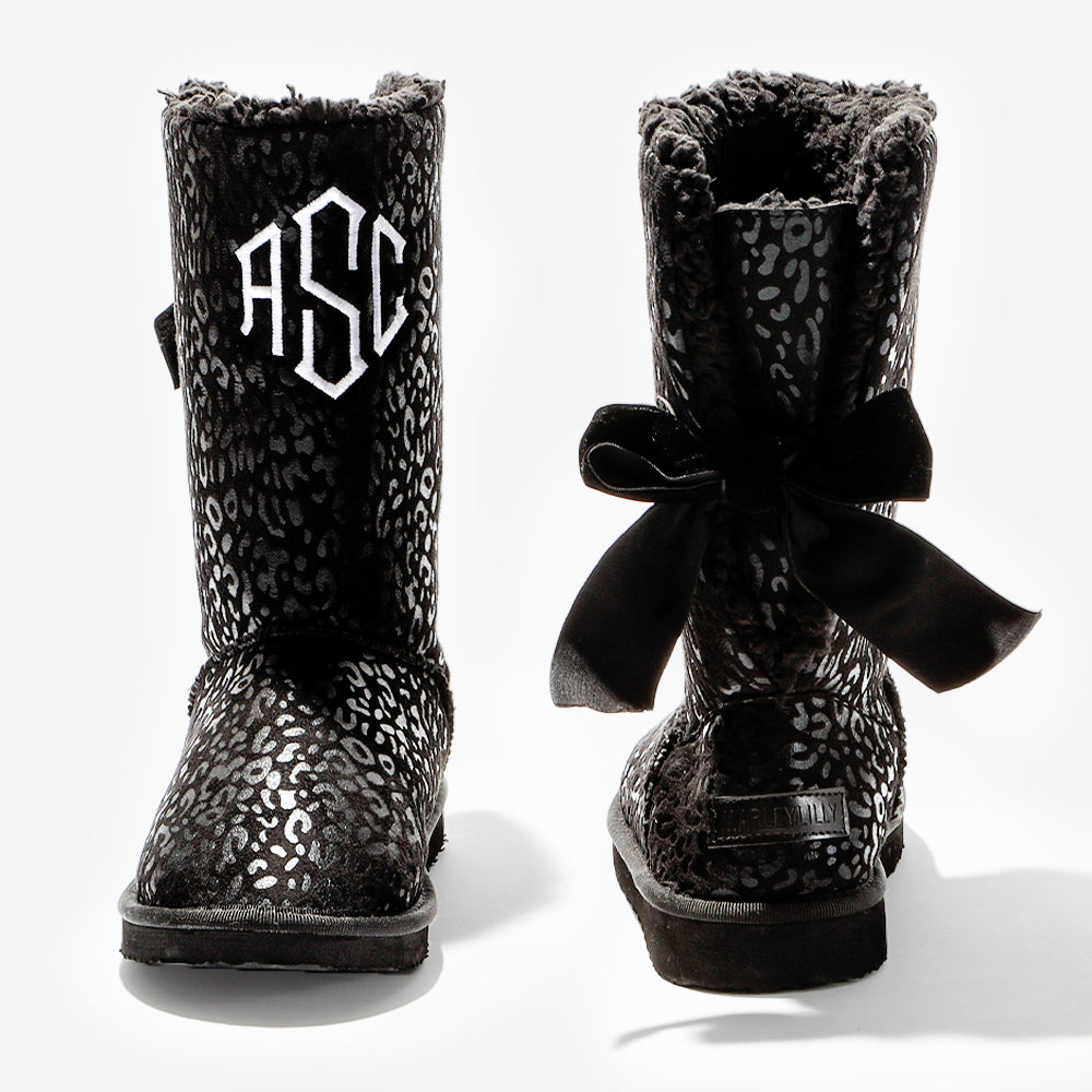 monogrammed sherpa tie booties in onyx leopard