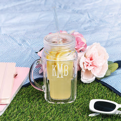 personalized mason jar on picnic blanket with lemonade