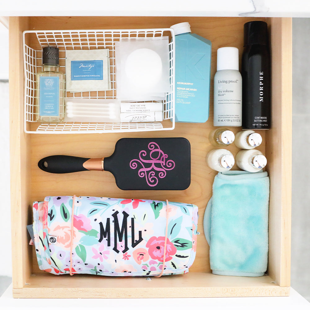 black hairbrush in drawer