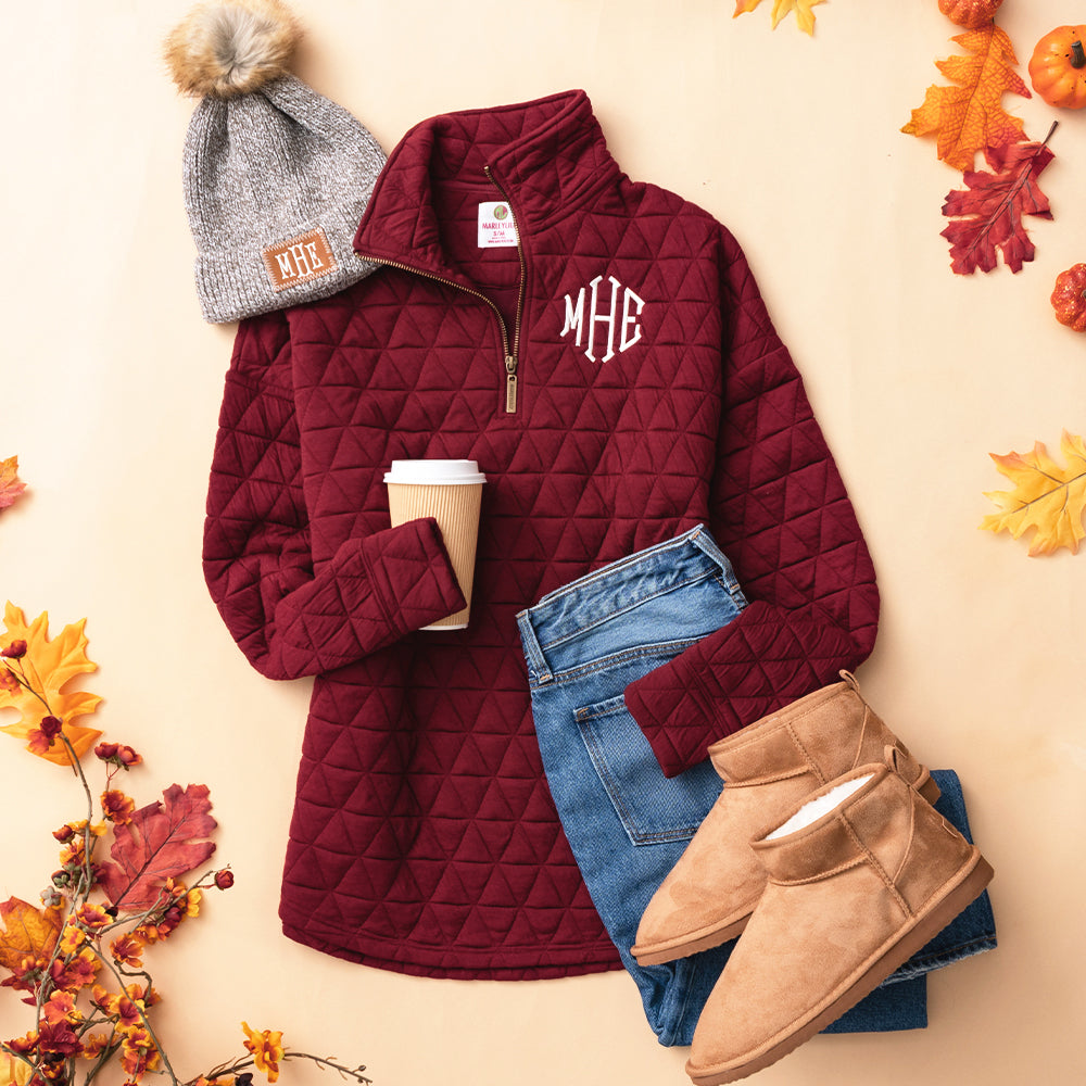 crimson quilted quarter zip pullover flatlay