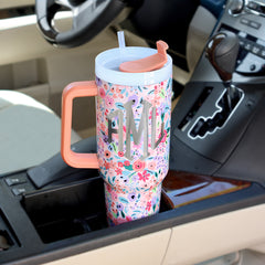 40 oz coral floral travel tumbler in car cup holder