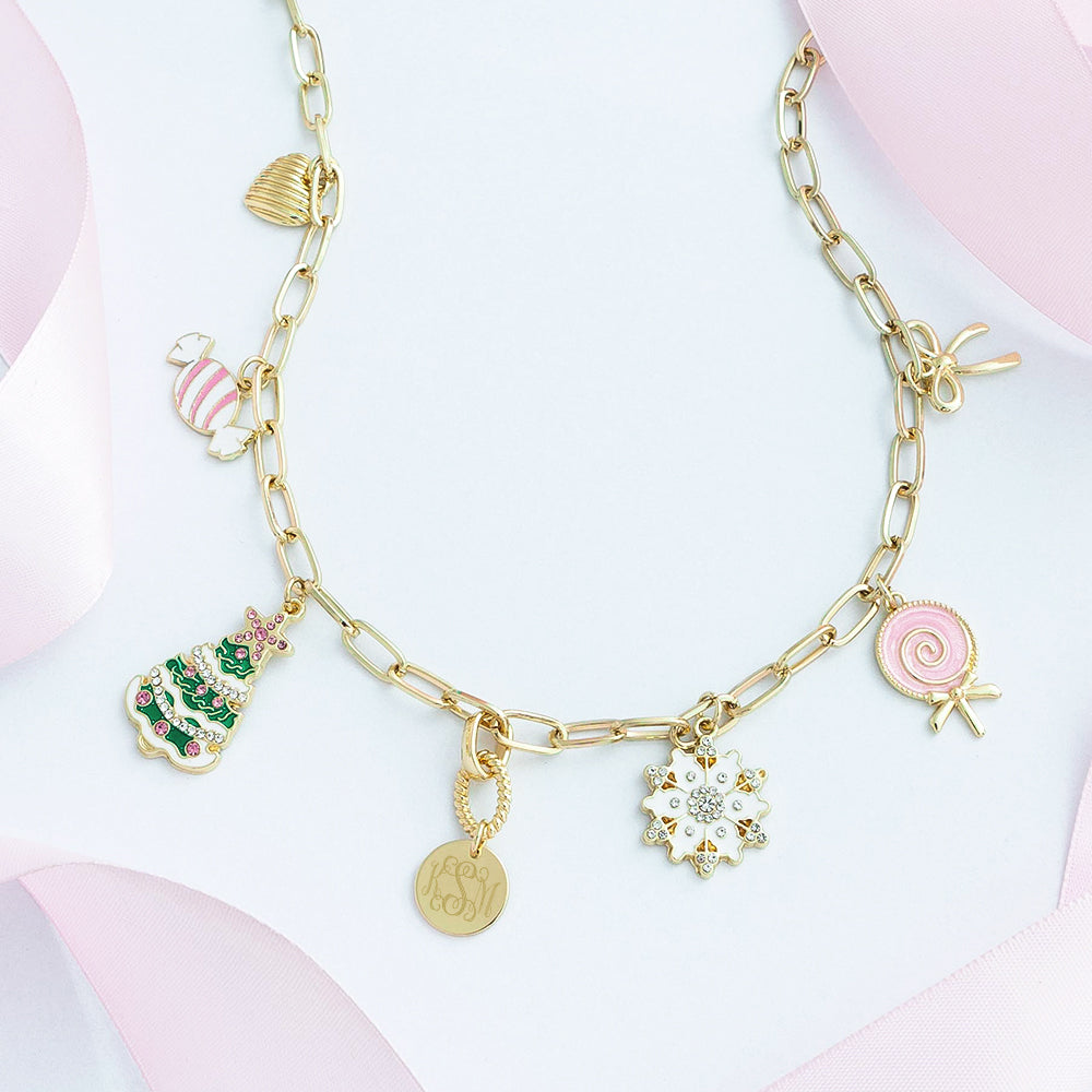 Christmas Charm Necklace flatlay with ribbon