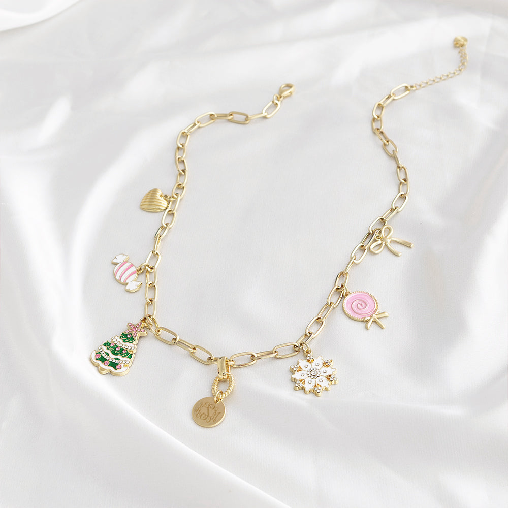 Christmas Charm Necklace on white satin