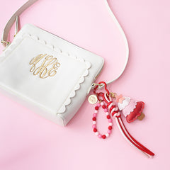 Christmas bag charm keychain with purse flatlay