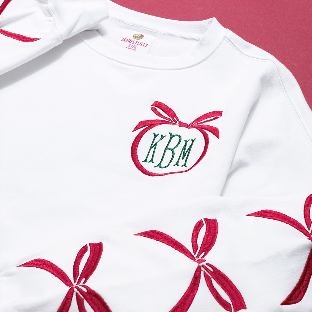 Christmas bow sweatshirt detail shot