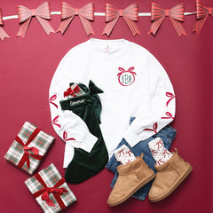 Christmas bow sweatshirt flatlay ootd