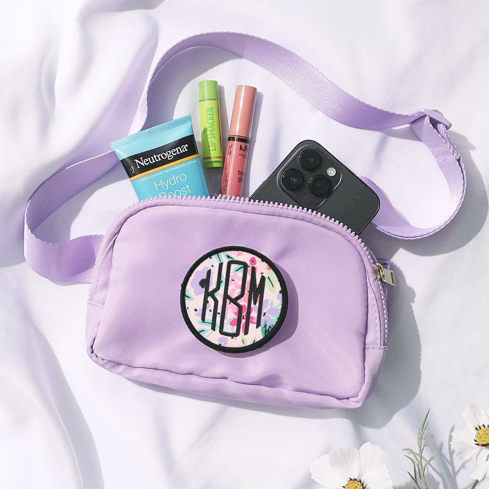 lavender belt bag with coral floral monogrammed patch