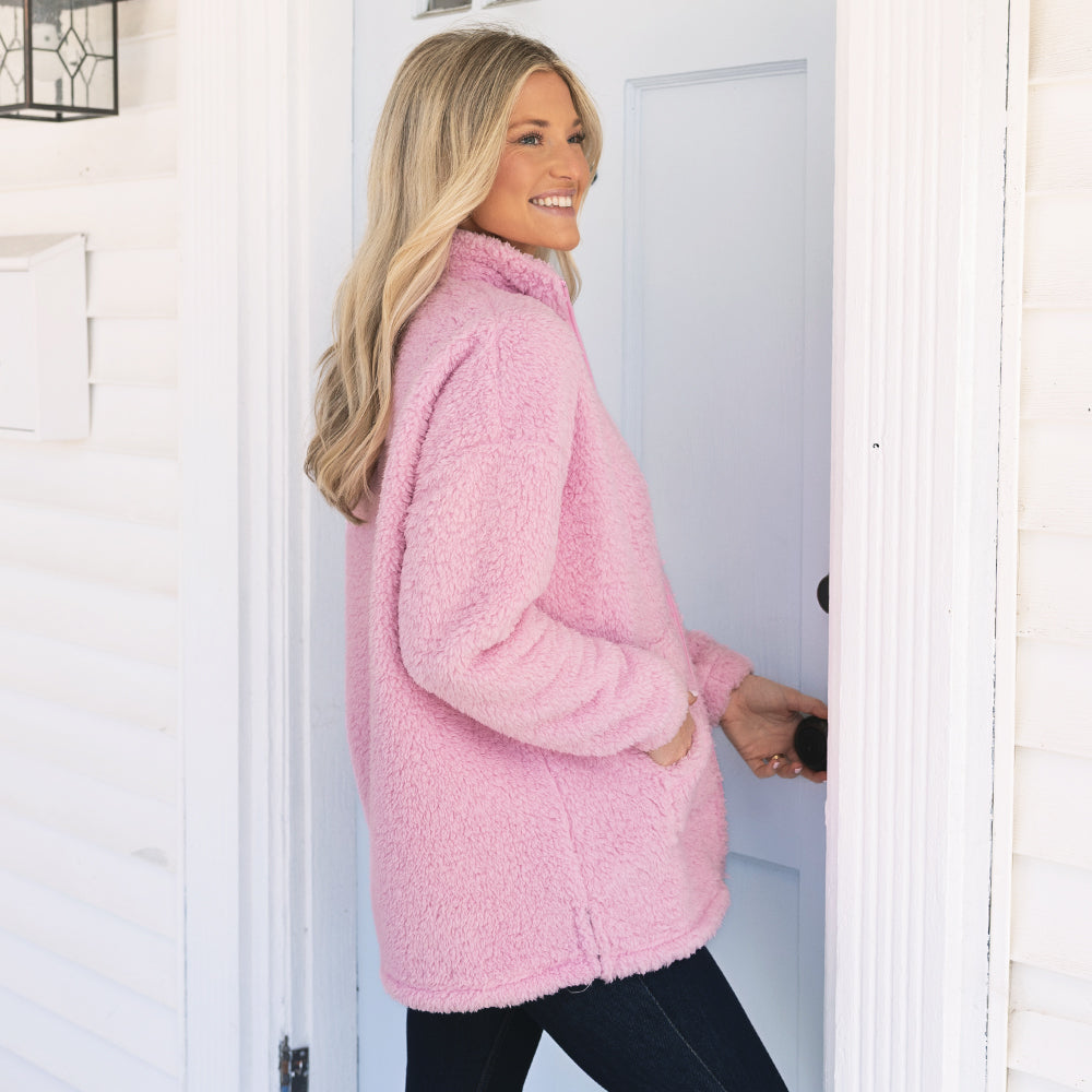 side of light pink full zip sherpa jacket