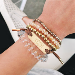 monogrammed brown and gold suede bracelet