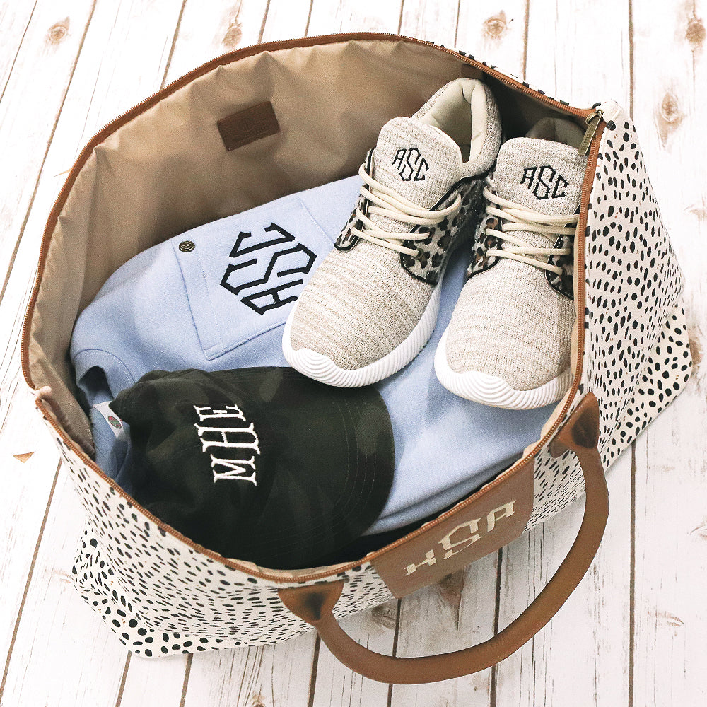 inside spring leopard weekender with zipper closure