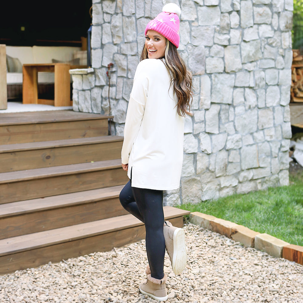 back of monogrammed tunic shirt in white