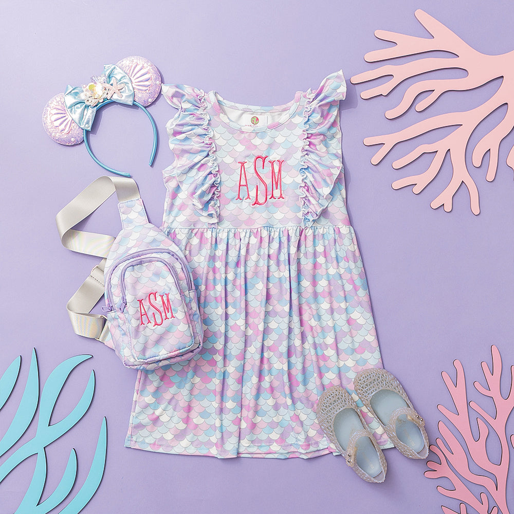 mermaid ruffle dress and sling bag flatlay