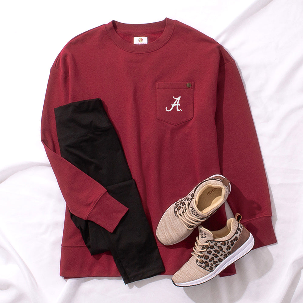alabama crimson crewneck outfit styled with leggings and leopard sneakers
