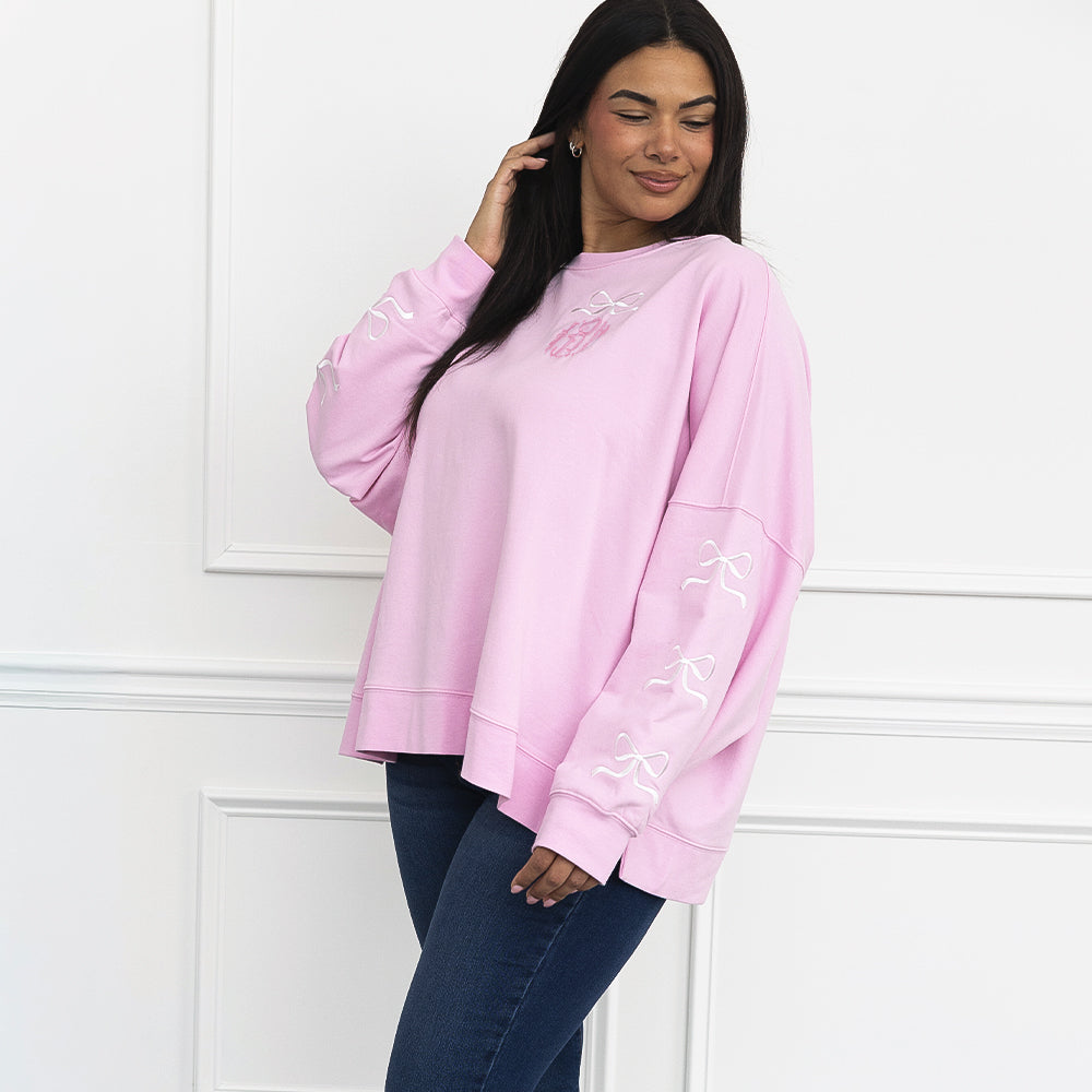 Embroidered Bows Sweatshirt on julia ann side view