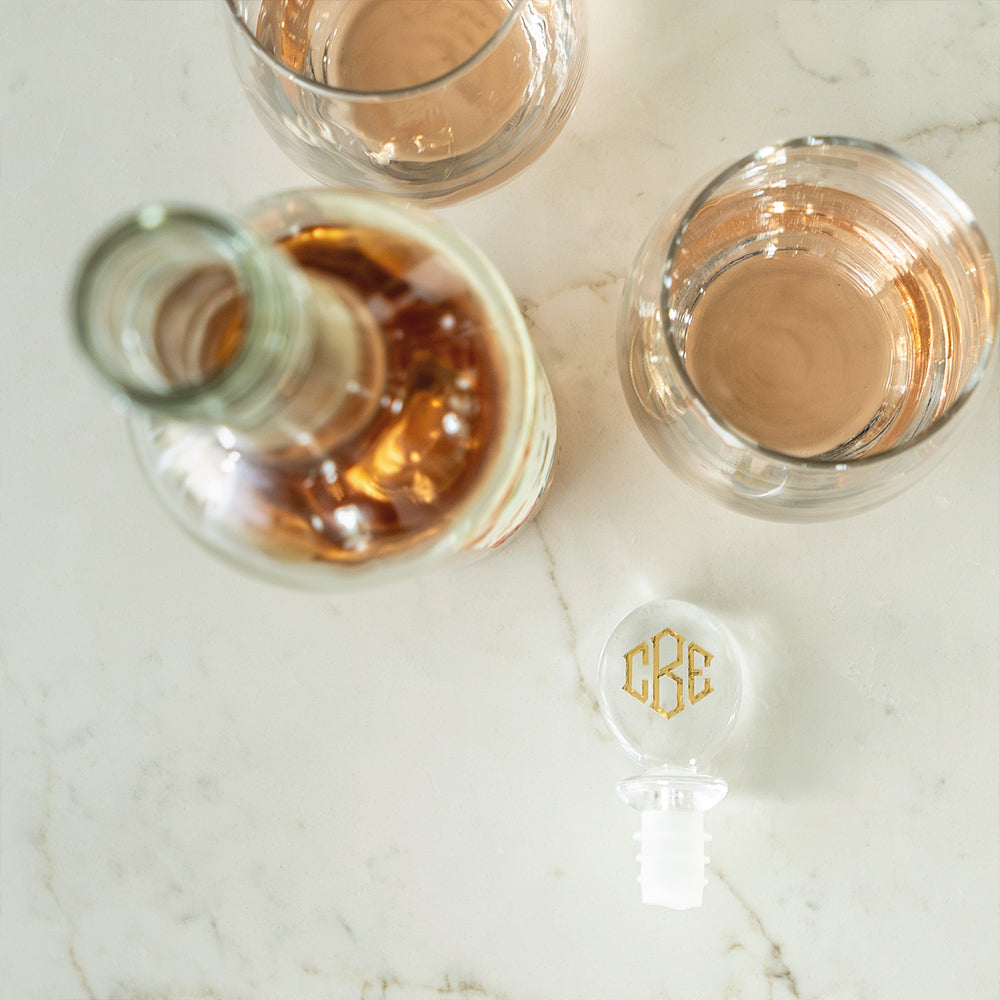 wine glasses and stopper on table