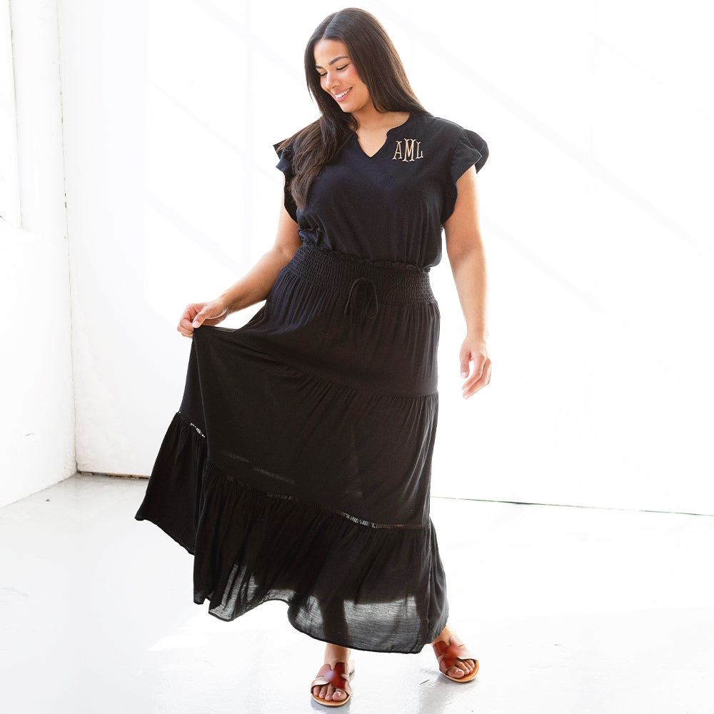 black flutter sleeve top with midi skirt