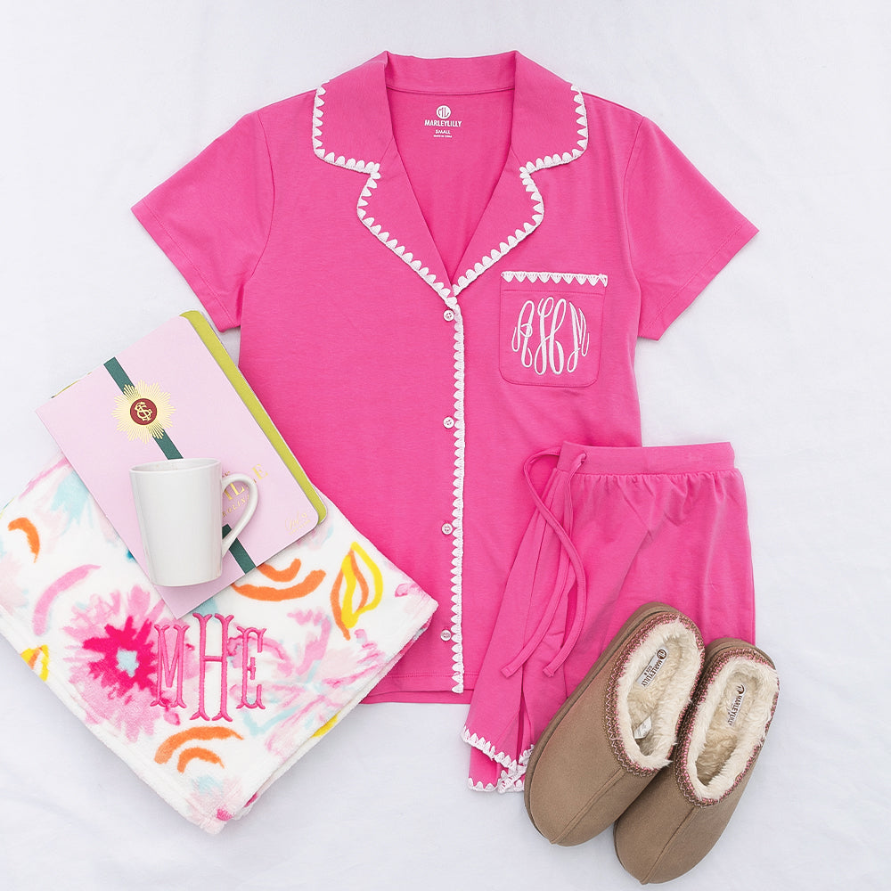 FA26 classic sleep set flatlay in hot pink