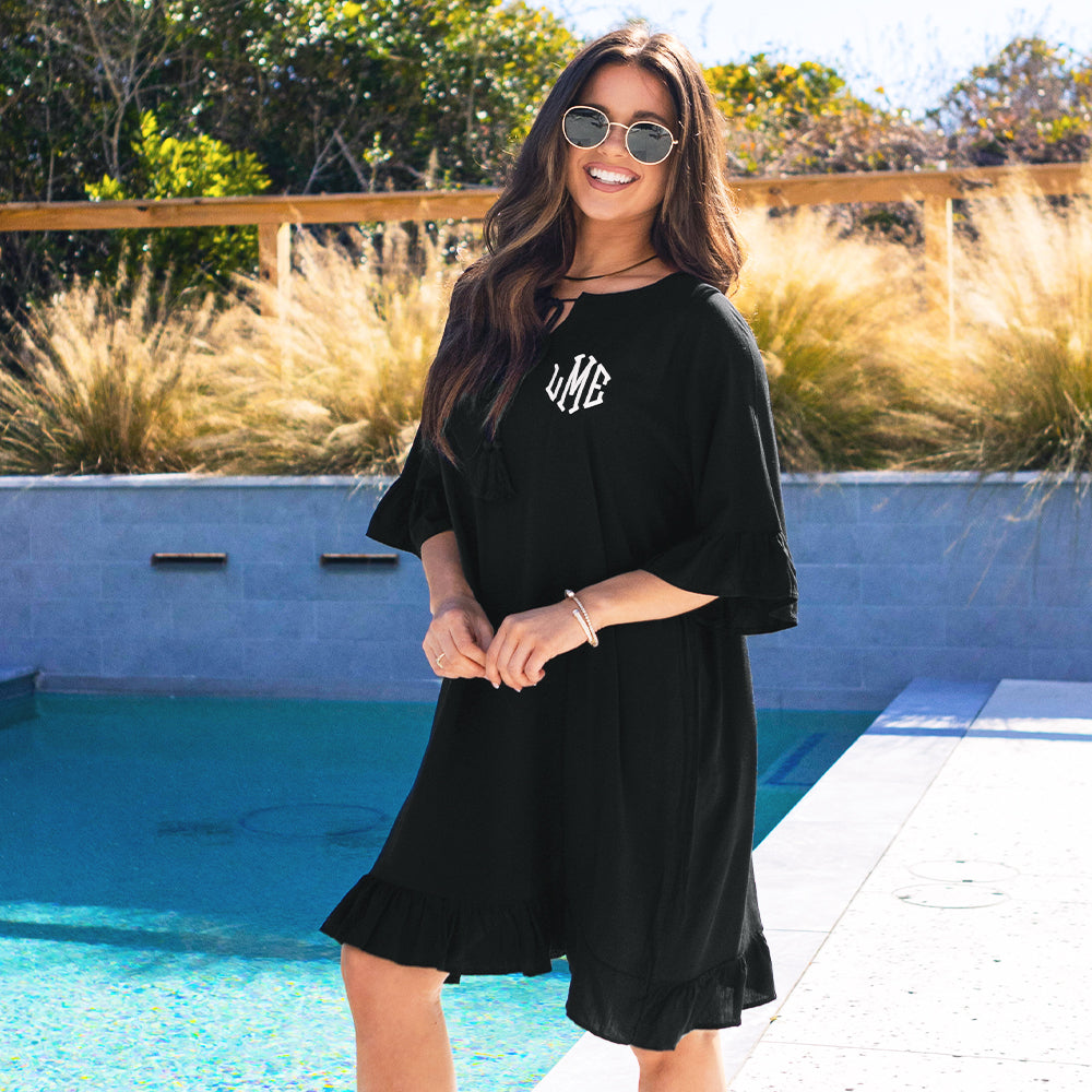 black cover up by pool
