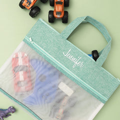 Seafoam toy storage bag flatlay