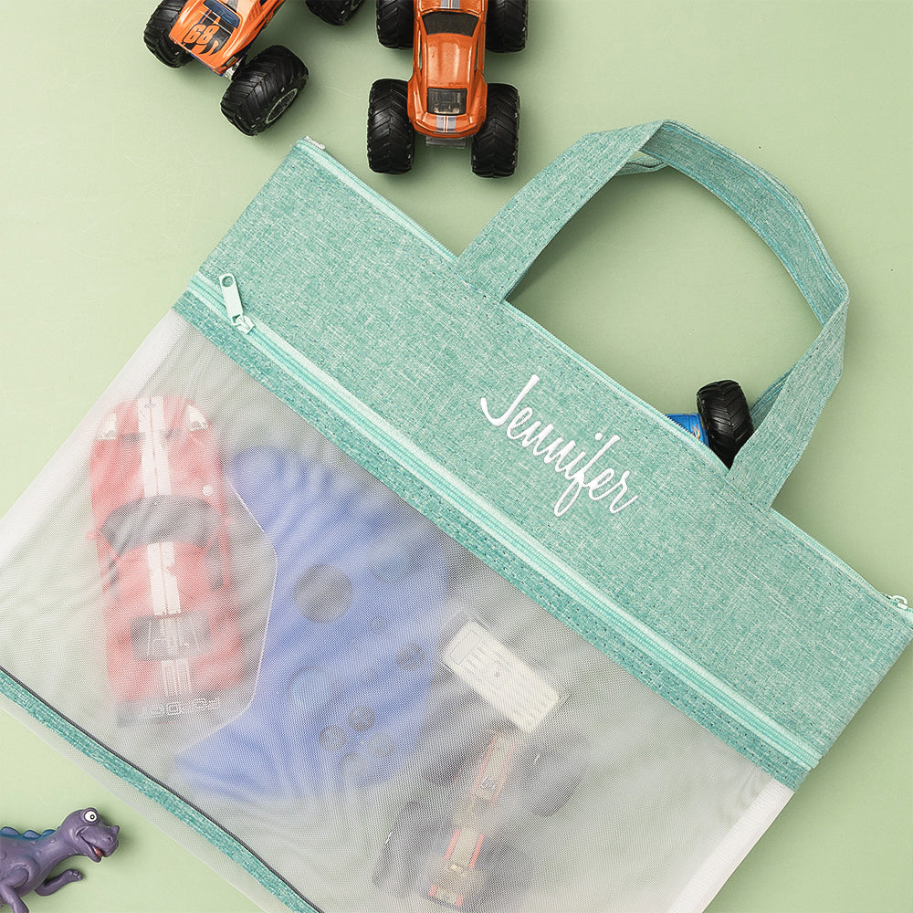 Seafoam toy storage bag flatlay
