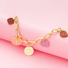 Fall charm bracelet on pink