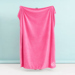 pink plush blanket with blue background