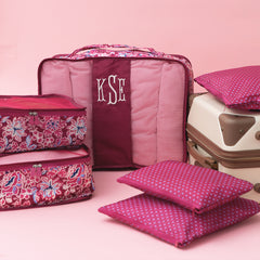 Burgundy Woodland Blossom packing bag set on pink
