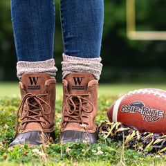wofford duck boots with brown socks on football field
