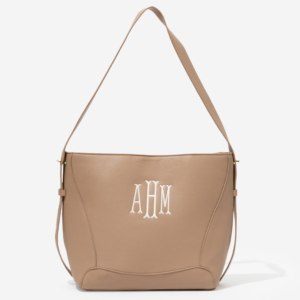 monogrammed bucket bag in taupe angle