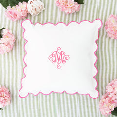 pink scalloped pillow sham flatlay