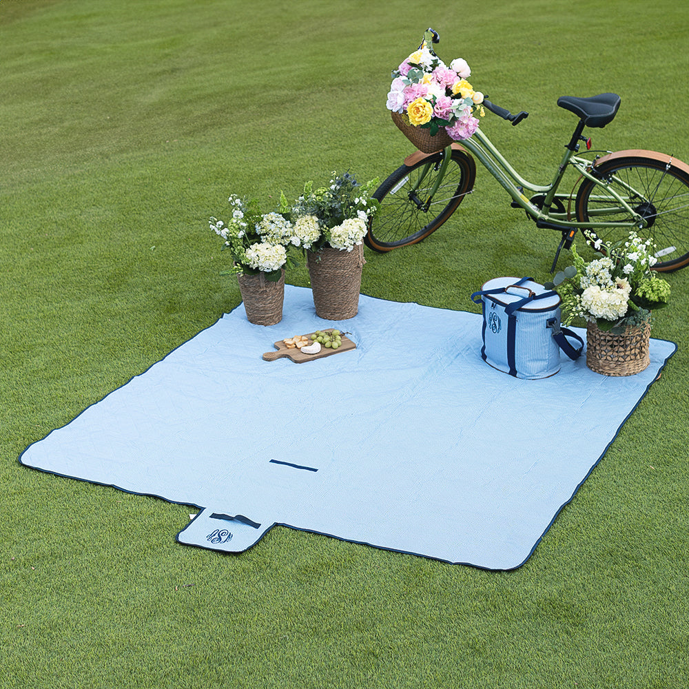 navy seersucker monogrammed picnic blanket spread out
