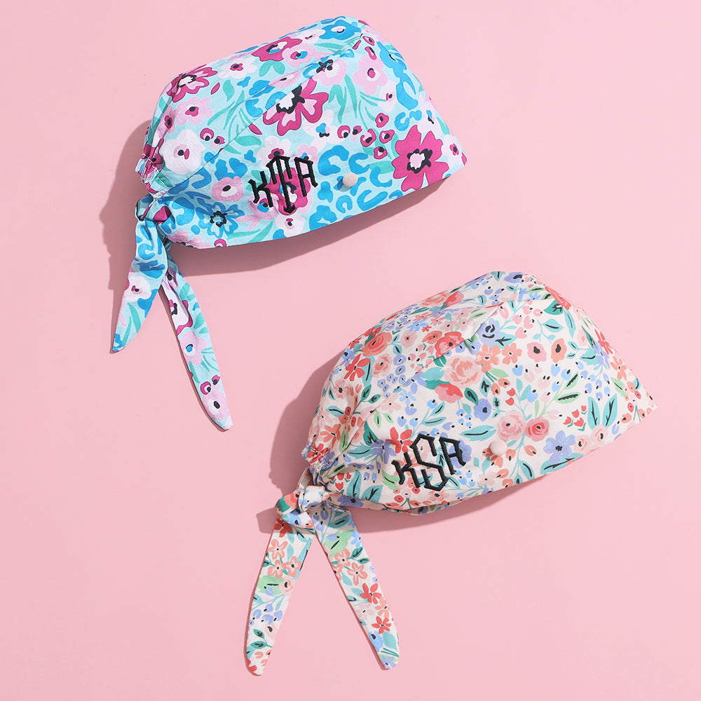 wild blooms and coral floral monogrammed scrub caps together