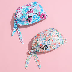 wild blooms and coral floral monogrammed scrub caps together