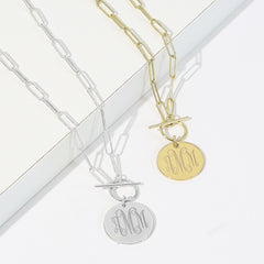 monogrammed pendant necklace in gold and silver