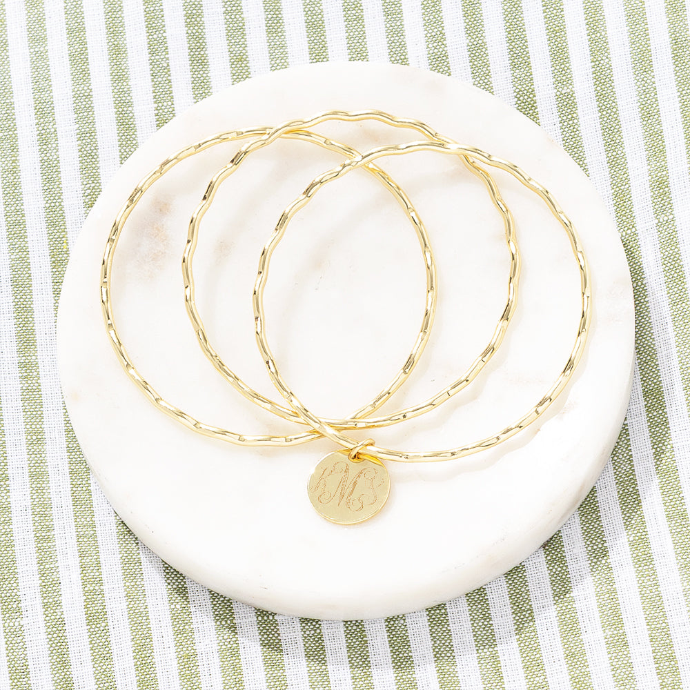 Gold Scalloped Bangle on green stripes