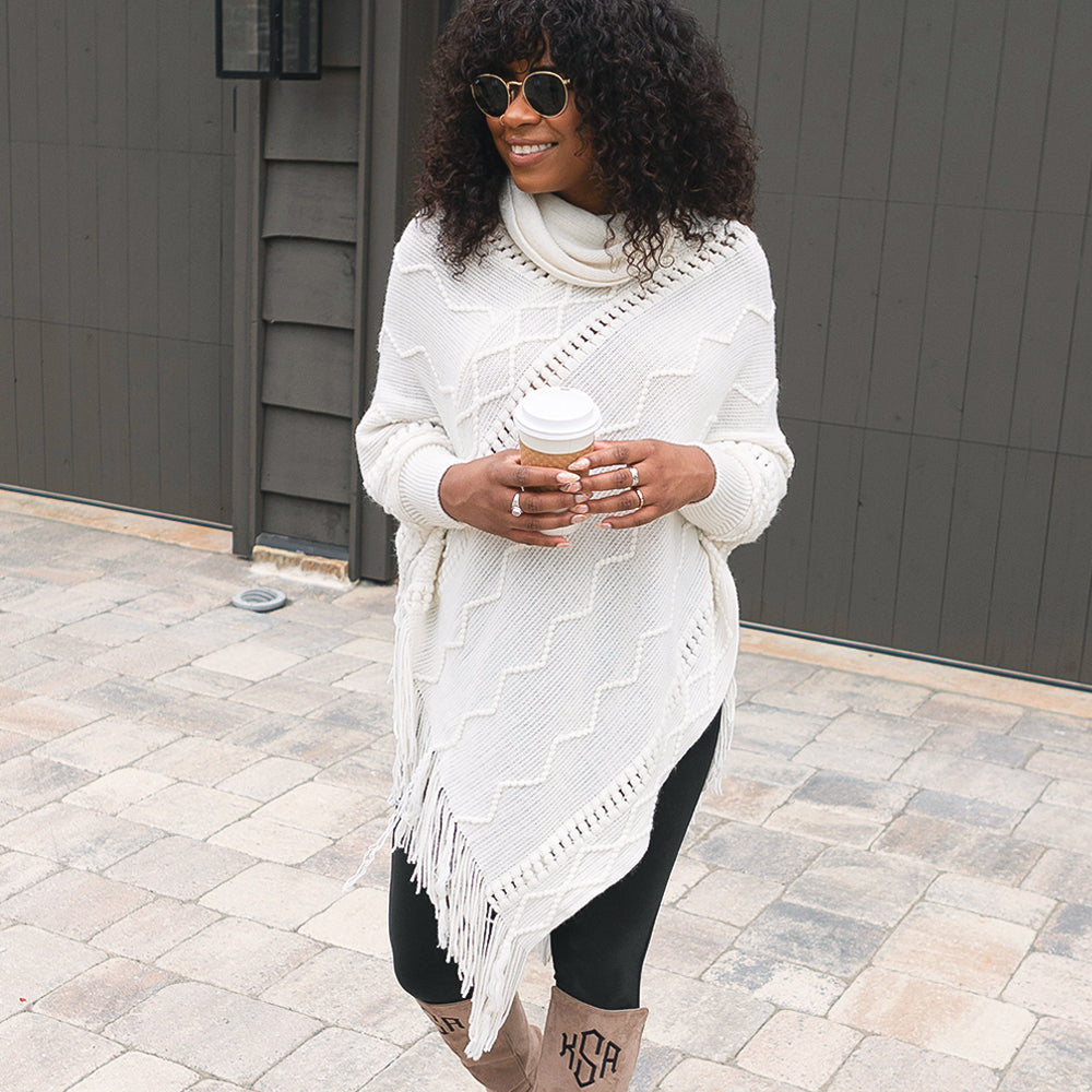 [Mia] Model wearing Poncho Sweater in Ivory