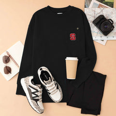 north carolina state wolfpack black crewneck sweatshirt flatlay