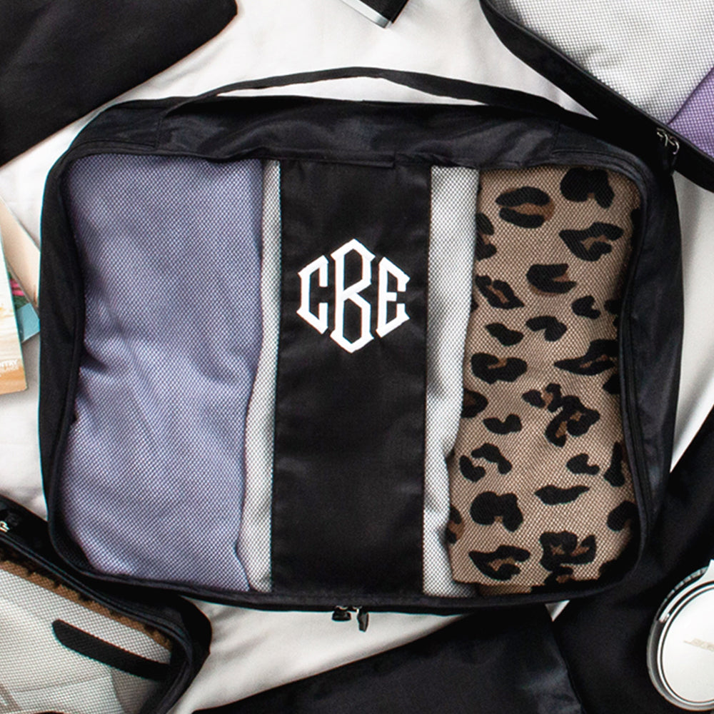 black packing bag flatlay