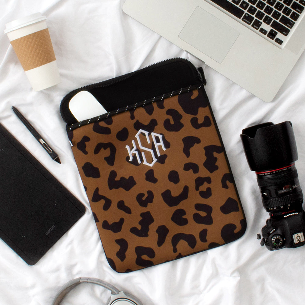 all contents that a laptop case would hold in hickory leopard