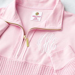 light pink waffle knit pullover up close