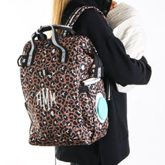 leopard diaper backpack on shoulder