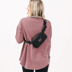 model wearing south carolina gamecocks belt bag on back
