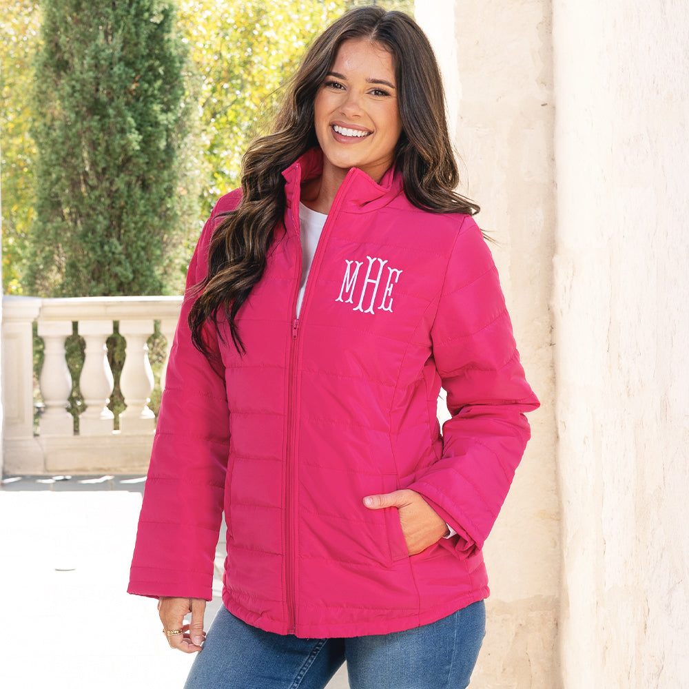[peyton] girl wearing monogrammed hot pink puffer jacket up close