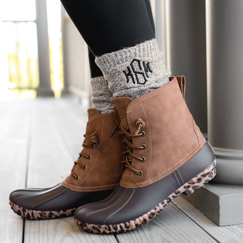 brown monogrammed socks with leopard bottom duck boots