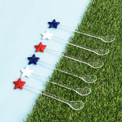 america star spoons on green grass