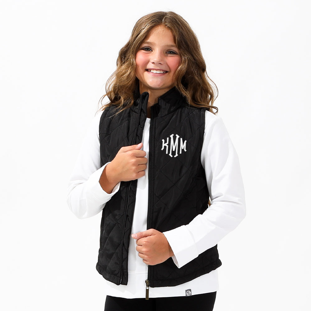 youth front view of black puffer vest