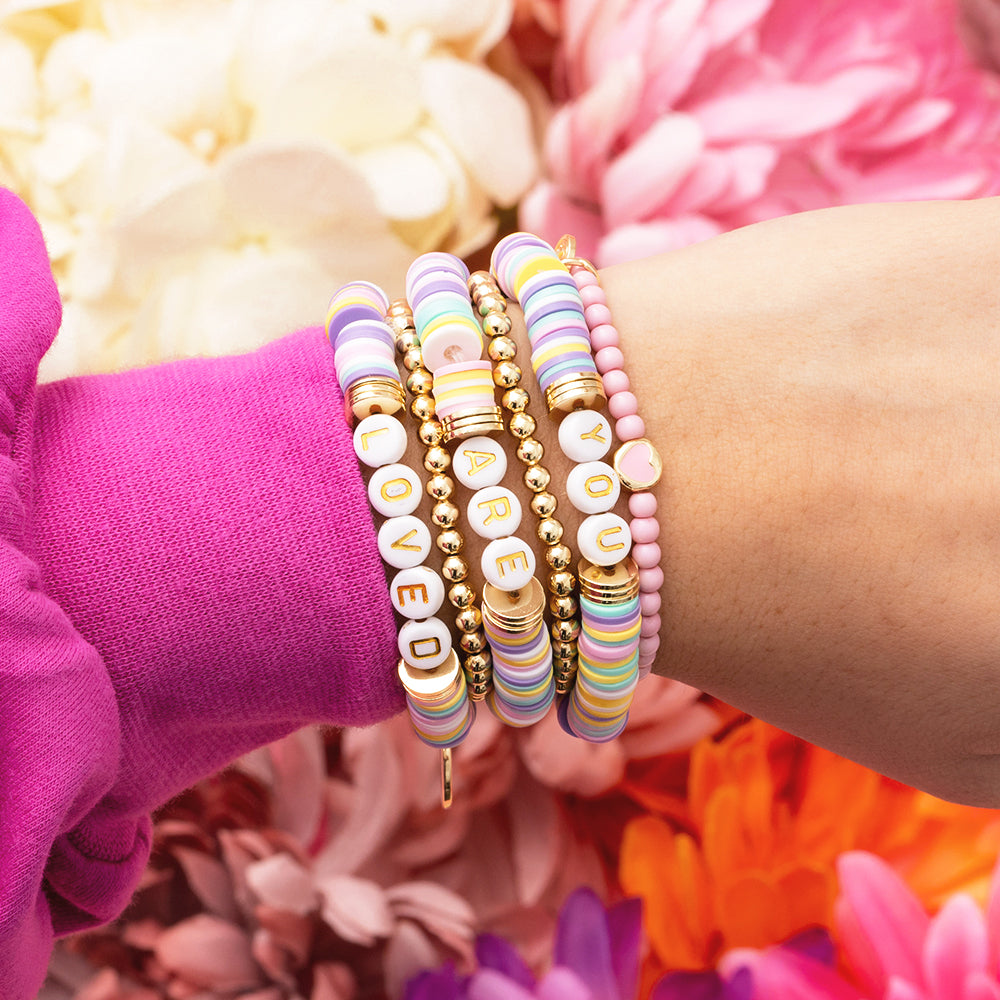 girls you are loved bracelets on arm