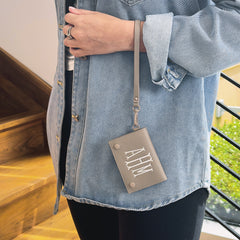 monogrammed card holder wristlet on wrist