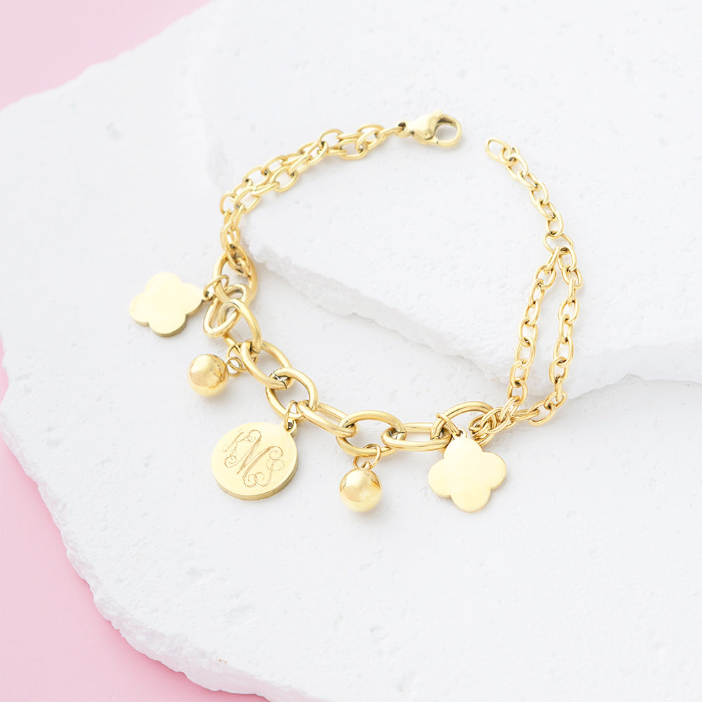 Monogrammed Clover charm Bracelet on marble